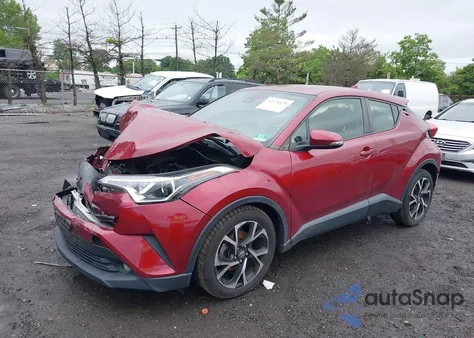 2018 Toyota C-Hr Xle Premium z USA, uszkodzony, nr VIN JTNKHMBX1J1002558